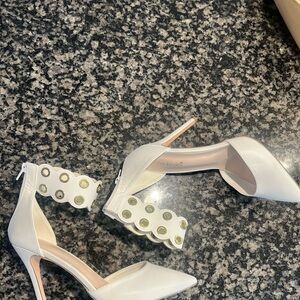 Elegant White Heels with Gold Accents